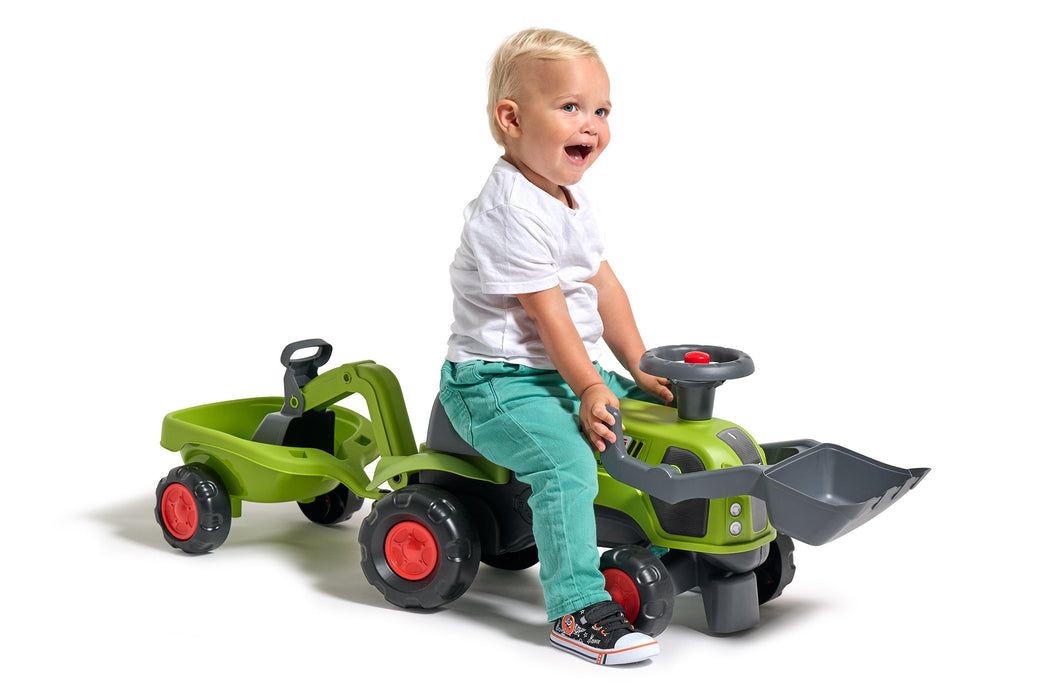 Claas Rutscher mit Heckbagger, Frontlader und Anhänger